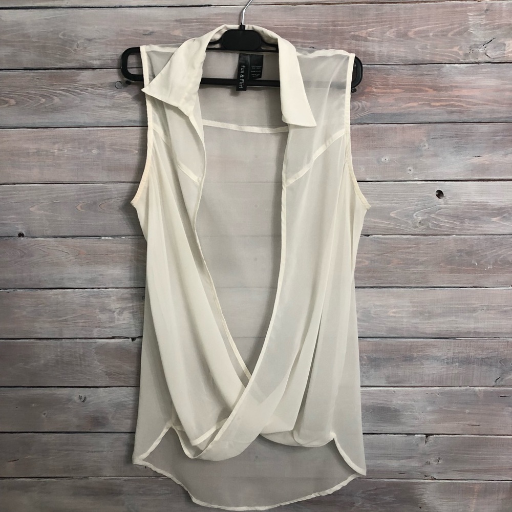 Cream color, light fabric tank top.